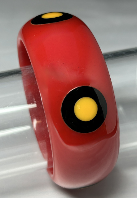 Pantti chunky red bakelite bangle with black and yellow bullseye dots