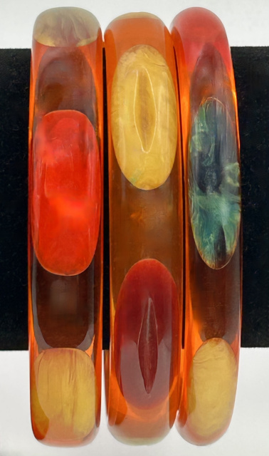 AB181 three Jesse Fowler orange prystal with oval dots bangles