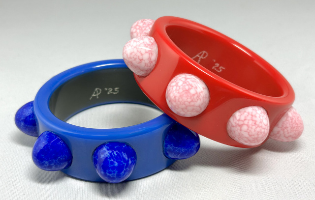 AP11 blue or red bakelite bangles with glass cabochons