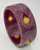 AB180 Brad Elfrink marbled purple bakelite bangle with lemon drop "eye" dots