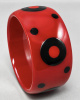 APK7 Atelier Papillon wide crimson red bakelite bangle with black and red bullseye dots 