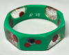 AP27 green octagon with red glitter dots
