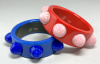 AP11 blue or red bakelite bangles with glass cabochons