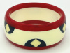 AP21 red, white and blue bordered, dotted and square inlaid bakelite bangle