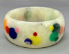 APK10 Atelier Papillon marbled ivory lucite bangle with confetti bakelite and galalith dots